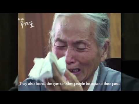 South korean elder woman cries as she tells her story as a Japanese military sexual slave.