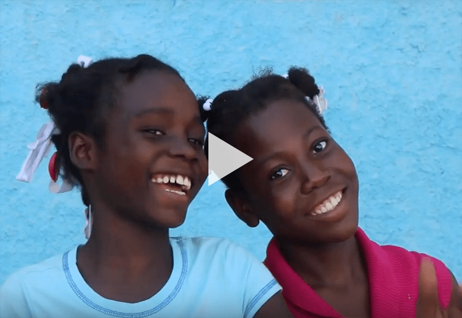two girls smiling